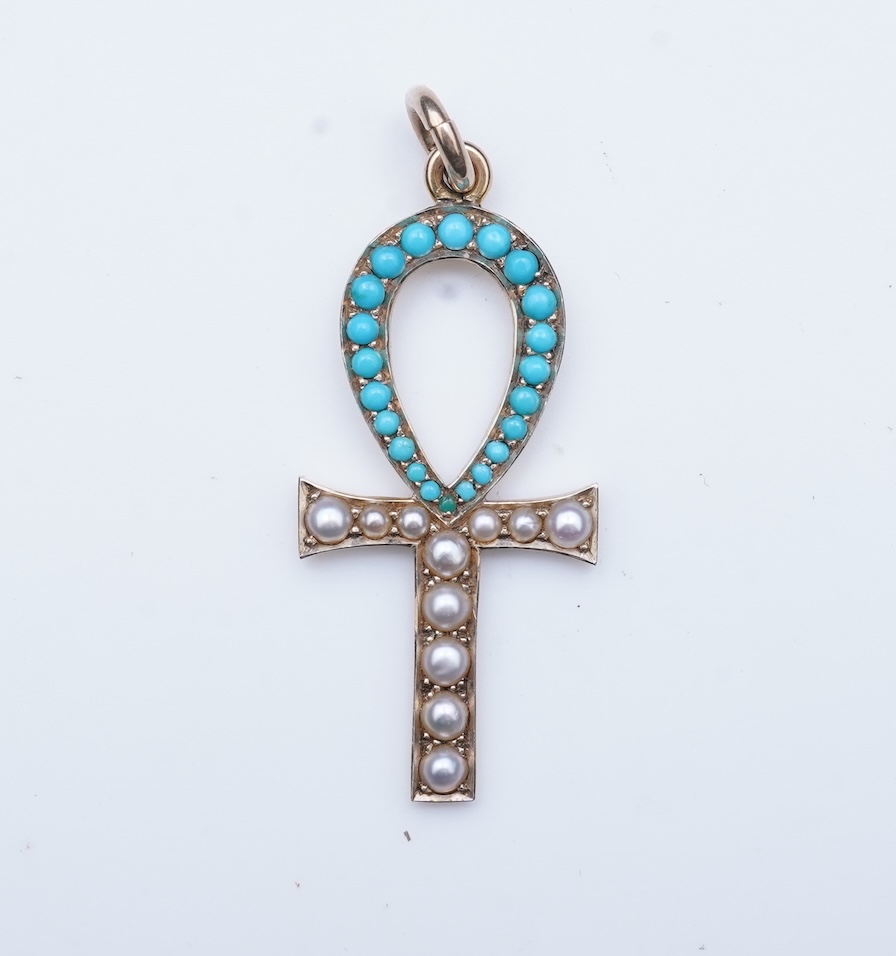 An Edwardian Egyptian revival turquoise and pearl pendant, early 20th century
